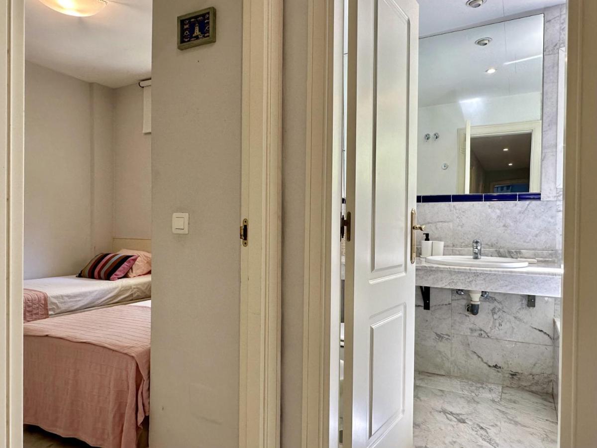 Blue House In Guadalmina Baja, With A Large Terrace Overlooking The Golf